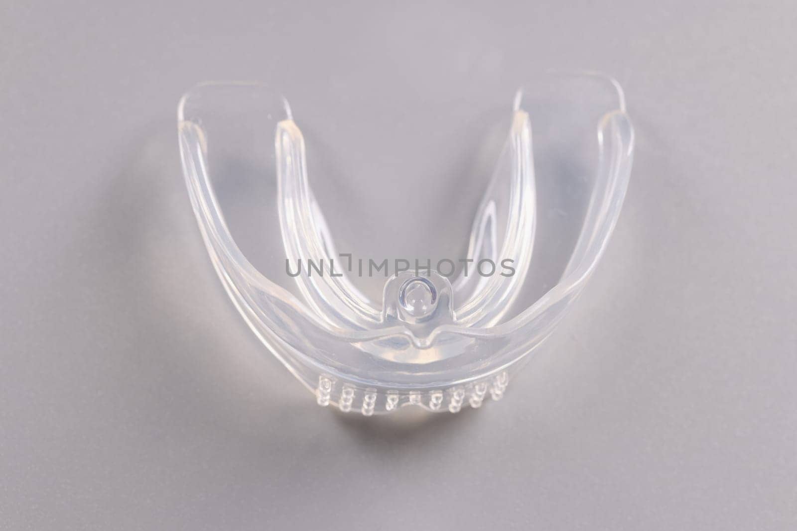 Silicone plastic tooth cap orthodontic trainer for bite correction by kuprevich