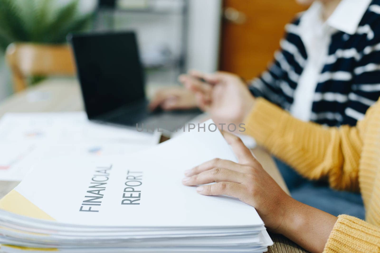 Asian entrepreneurs and business people meeting in a conference room in business planning, financial budget and investment risk assessment to analyze customer groups to increase company growth by Manastrong