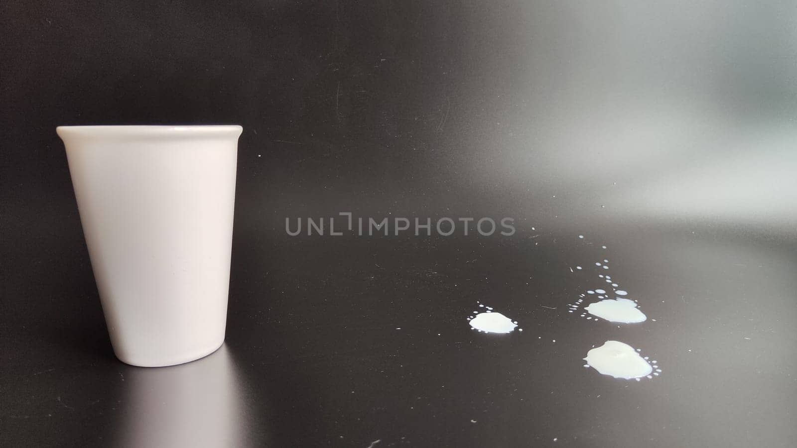 White coffee mug with black background with empty copy space