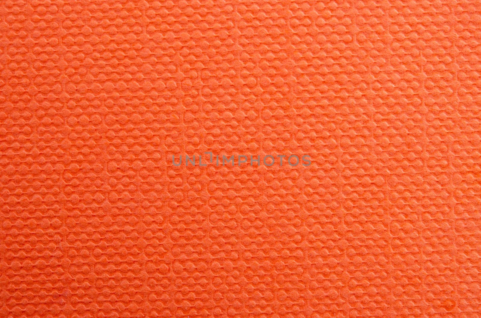 Abstract orange wrinkled paper texture background or backdrop.