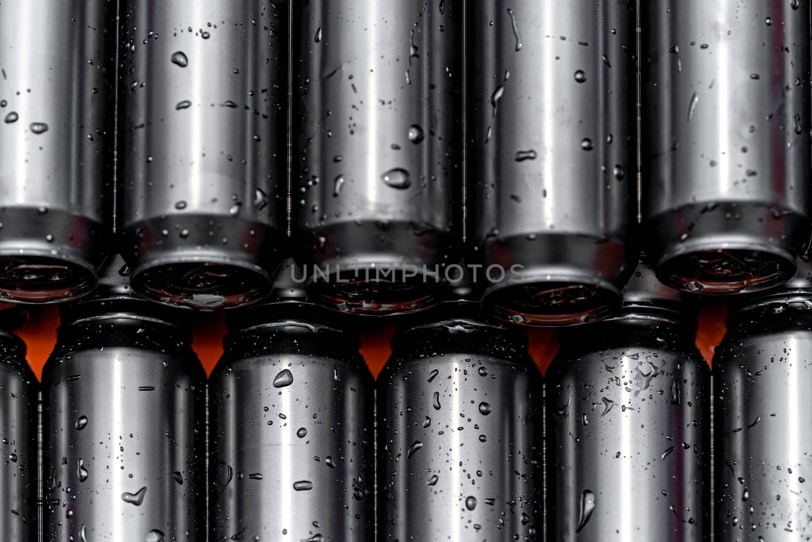 cans with beer in a crate in a brewery. High quality photo