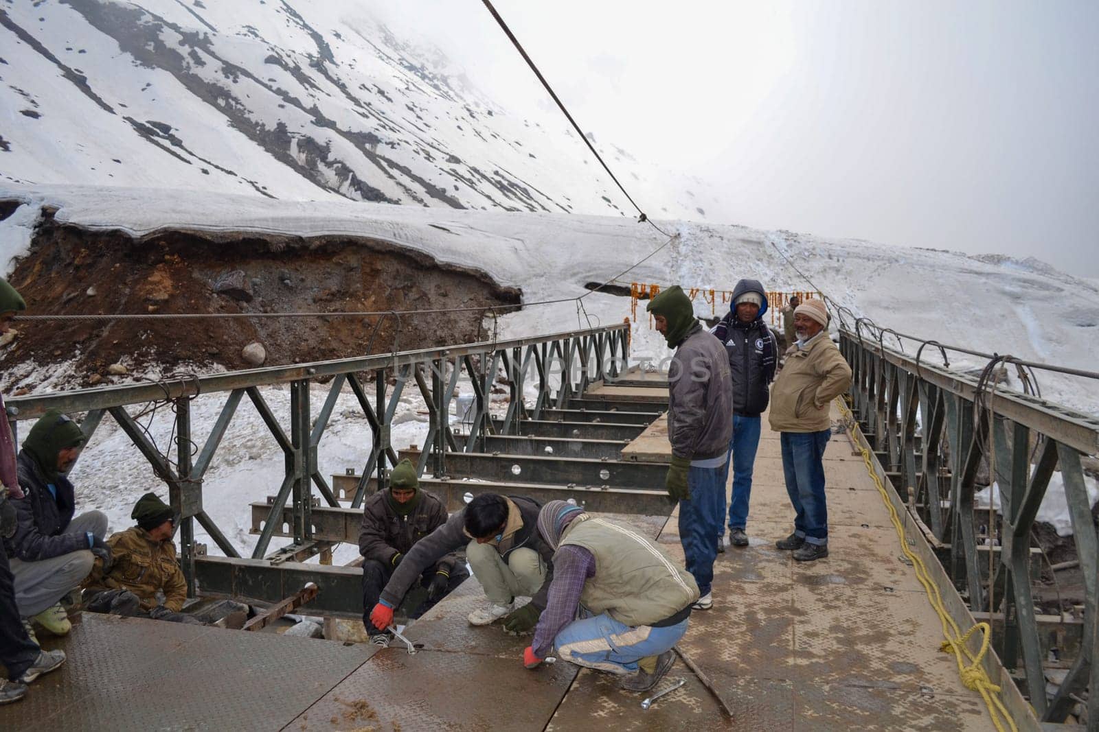 Rudarprayag, Uttarakhand, India, May 18 2014, Kedarnath reconstruction project, rebuilding bridges damaged in disaster. Kedarnath was devastated on June 2013 due to landslides and flash floods that killed more than 5000 people in Uttarakhand.