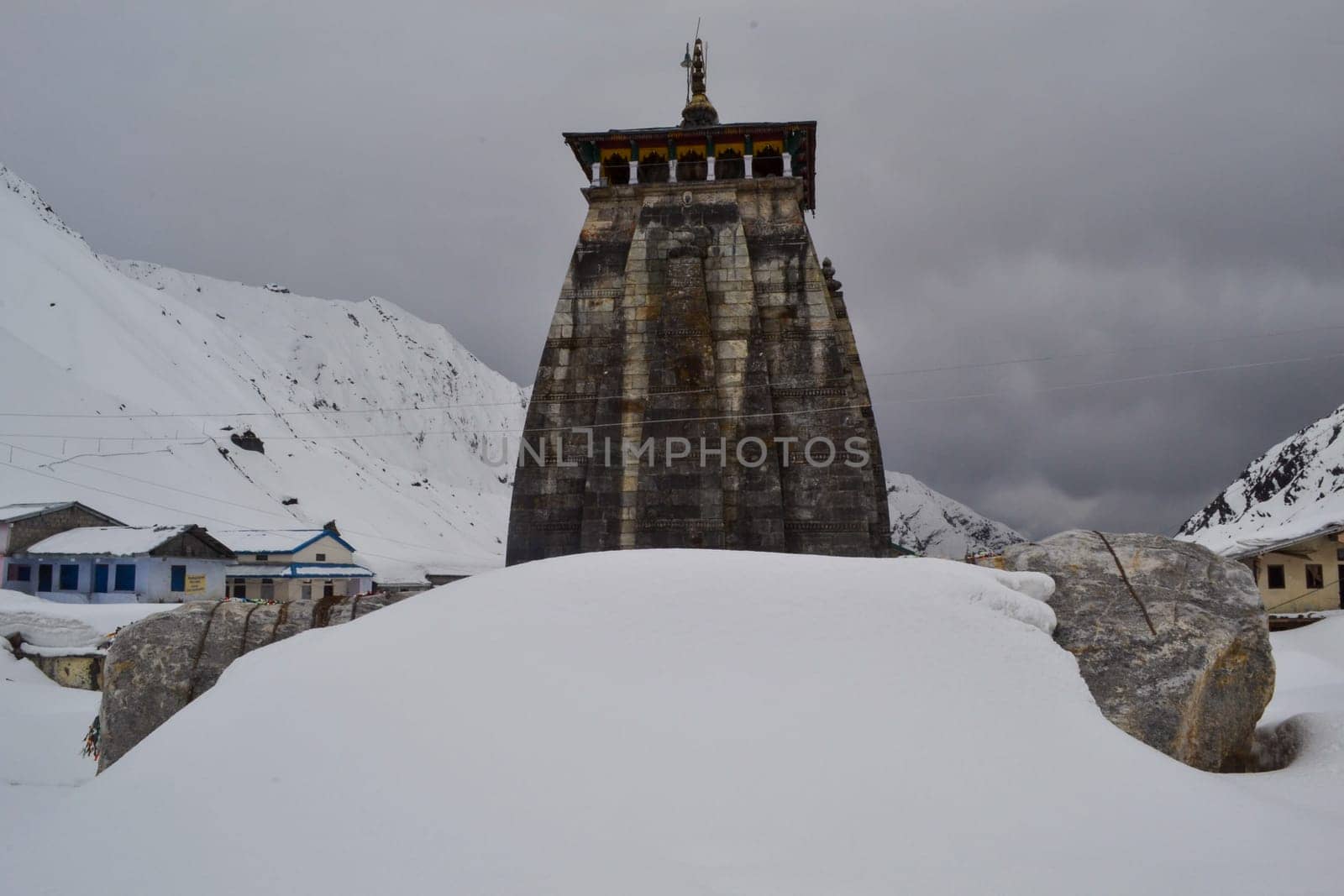 Snow covered Kedarnath temple and valley in Upper Himalaya India. by stocksvids