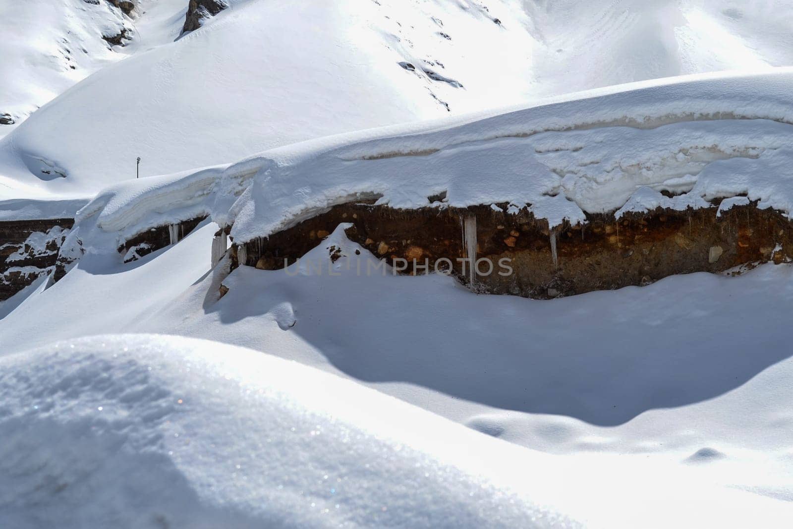 Snow-covered mountain peaks in Himalaya India. The Great Himalayas or Greater Himalayas probably is the highest mountain range of the Himalayan Range System.