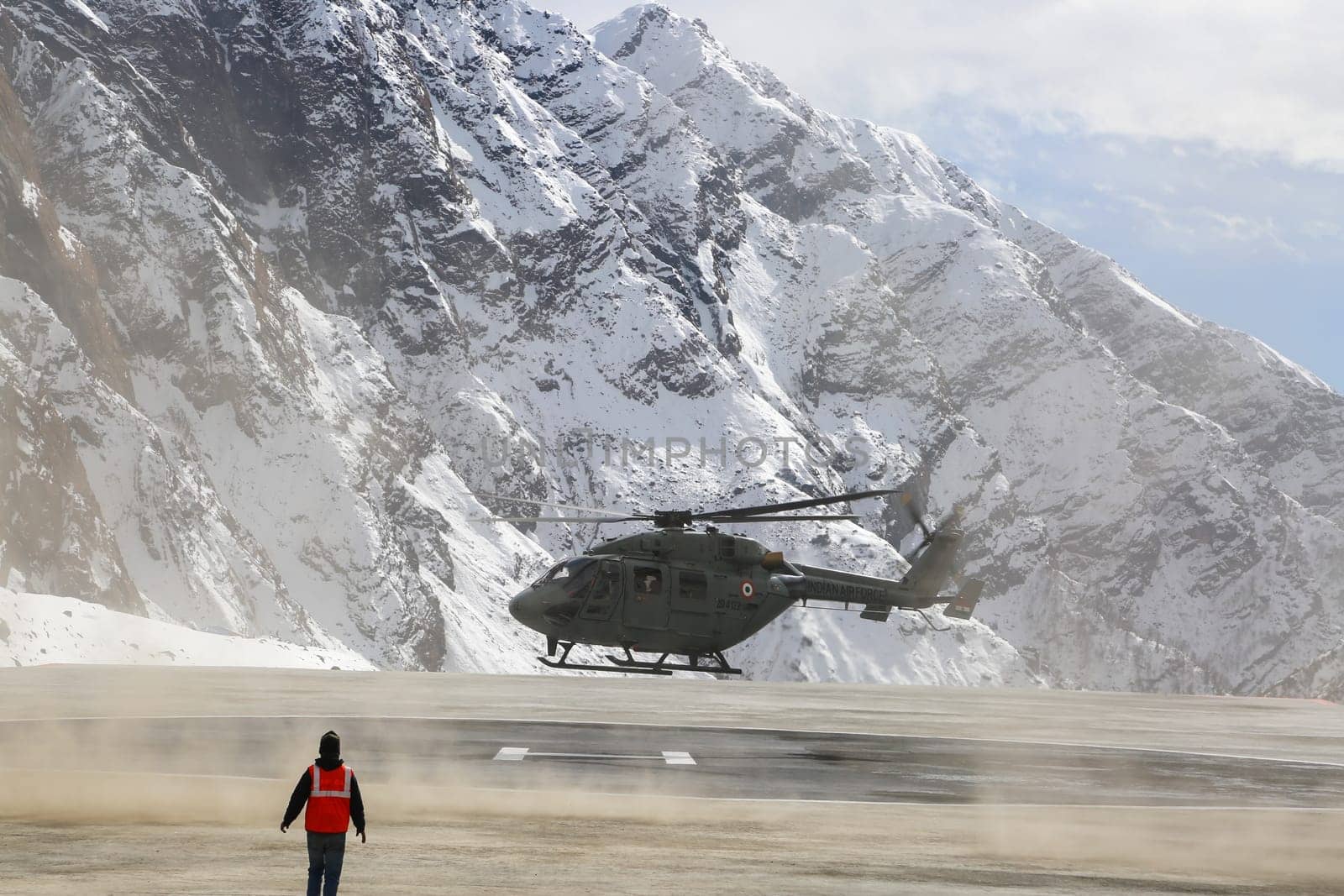 Indian Air force helicopter landing at high altitude in Himalaya. Indian Air Force is the air arm of the Indian Armed Forces. Its ranks fourth amongst the air forces of the world.