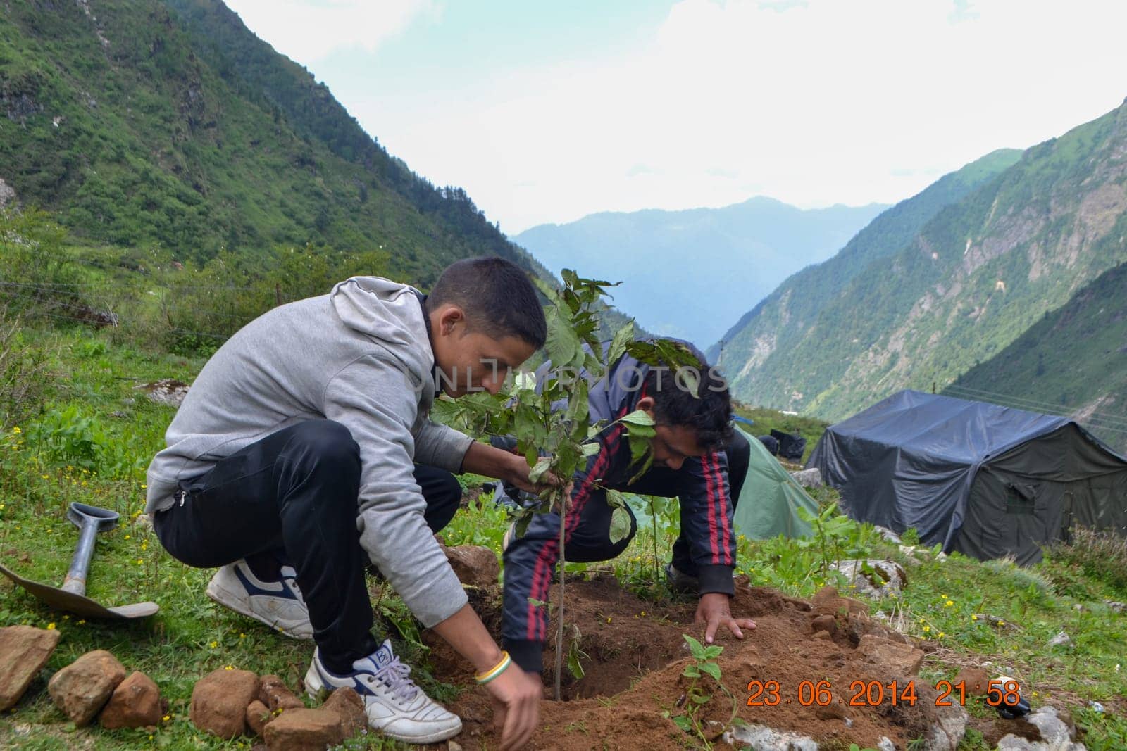 Rudarprayag, Uttarakhand, India, June 23 2014, Youngsters environment conservation, plantation in India. In India The Environment Protection Act was enacted in 1986.