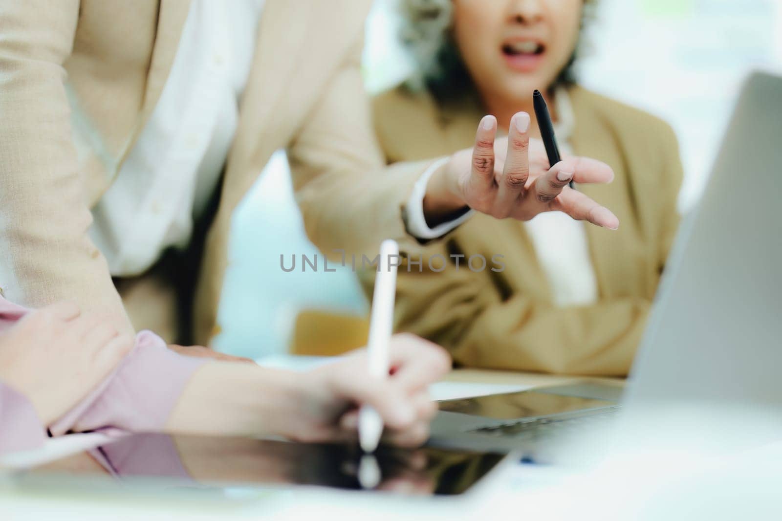 Asian entrepreneurs and business people meeting in a conference room in business planning, financial budget and investment risk assessment to analyze customer groups to increase company growth.