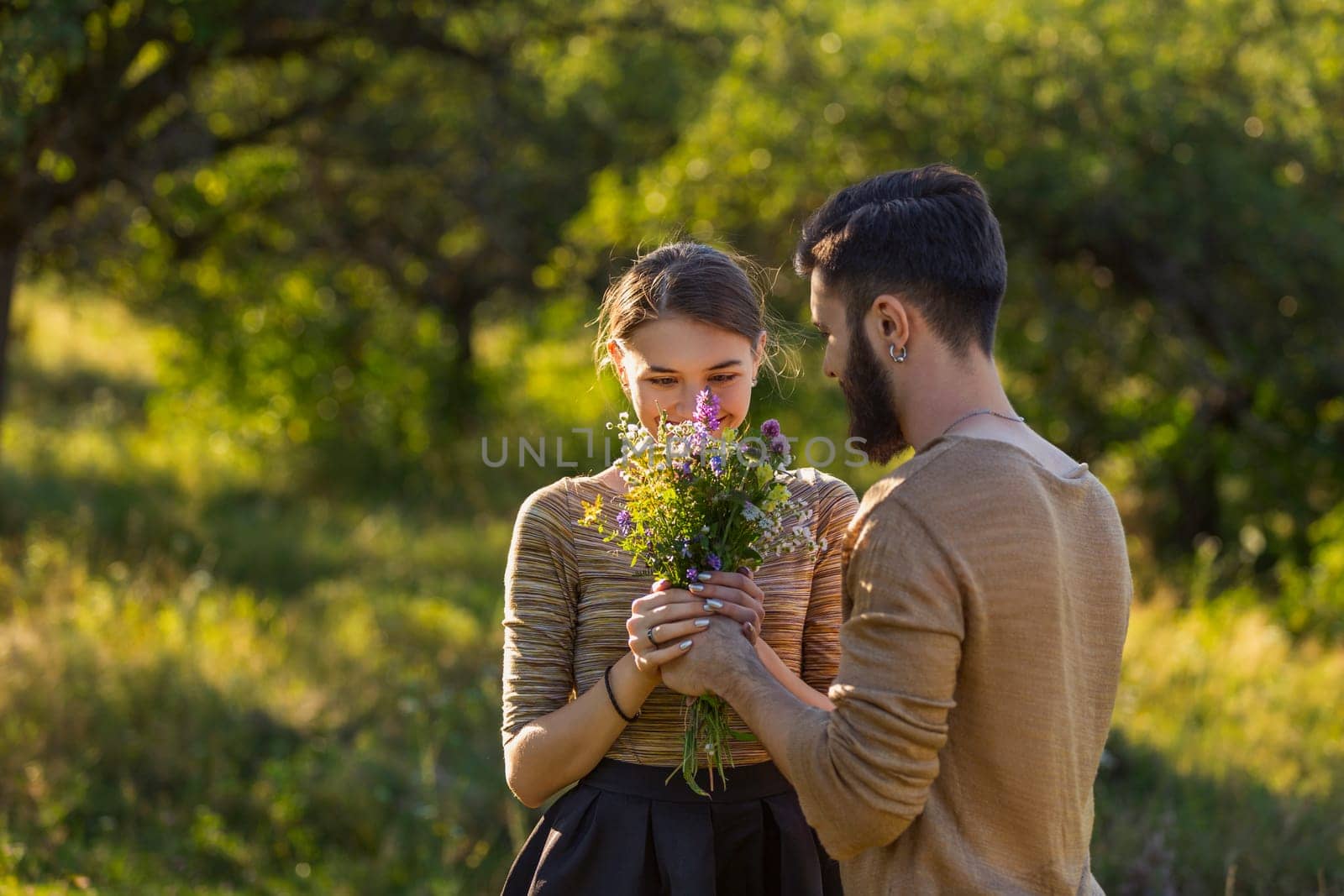man giving flowers to his girlfriend by zokov