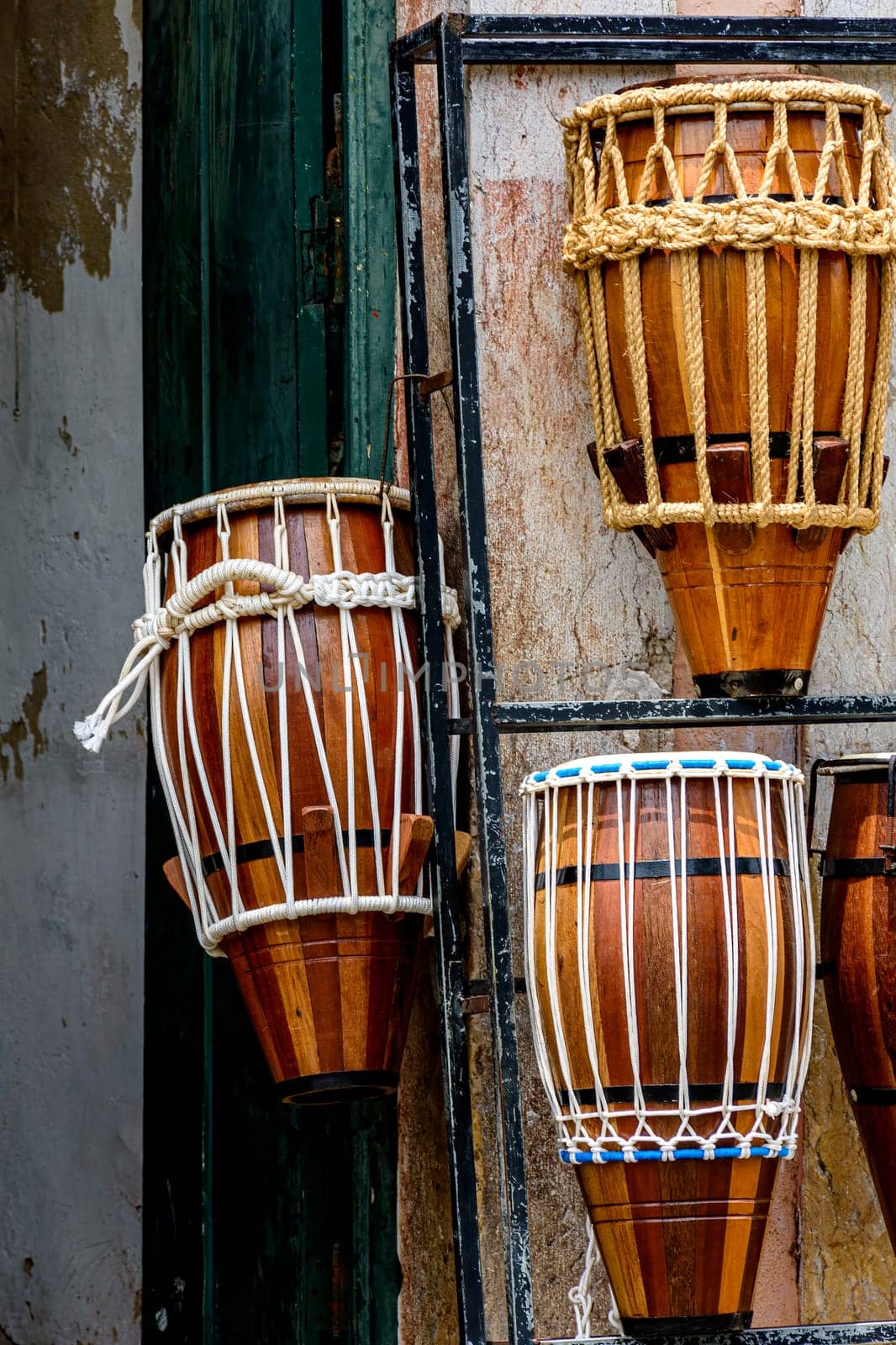 Atabaques displayed for sale in a musical instrument shop in Salvador in Bahia