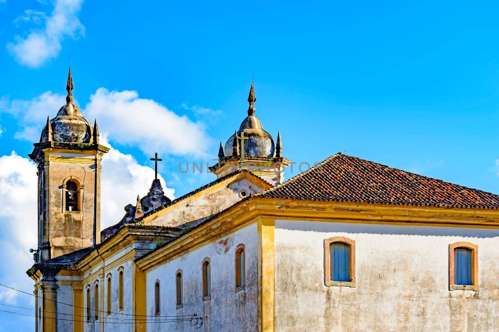 Back view of old catholic church of the 18th century located in the center of the famous and historical city of Ouro Preto in Minas Gerais