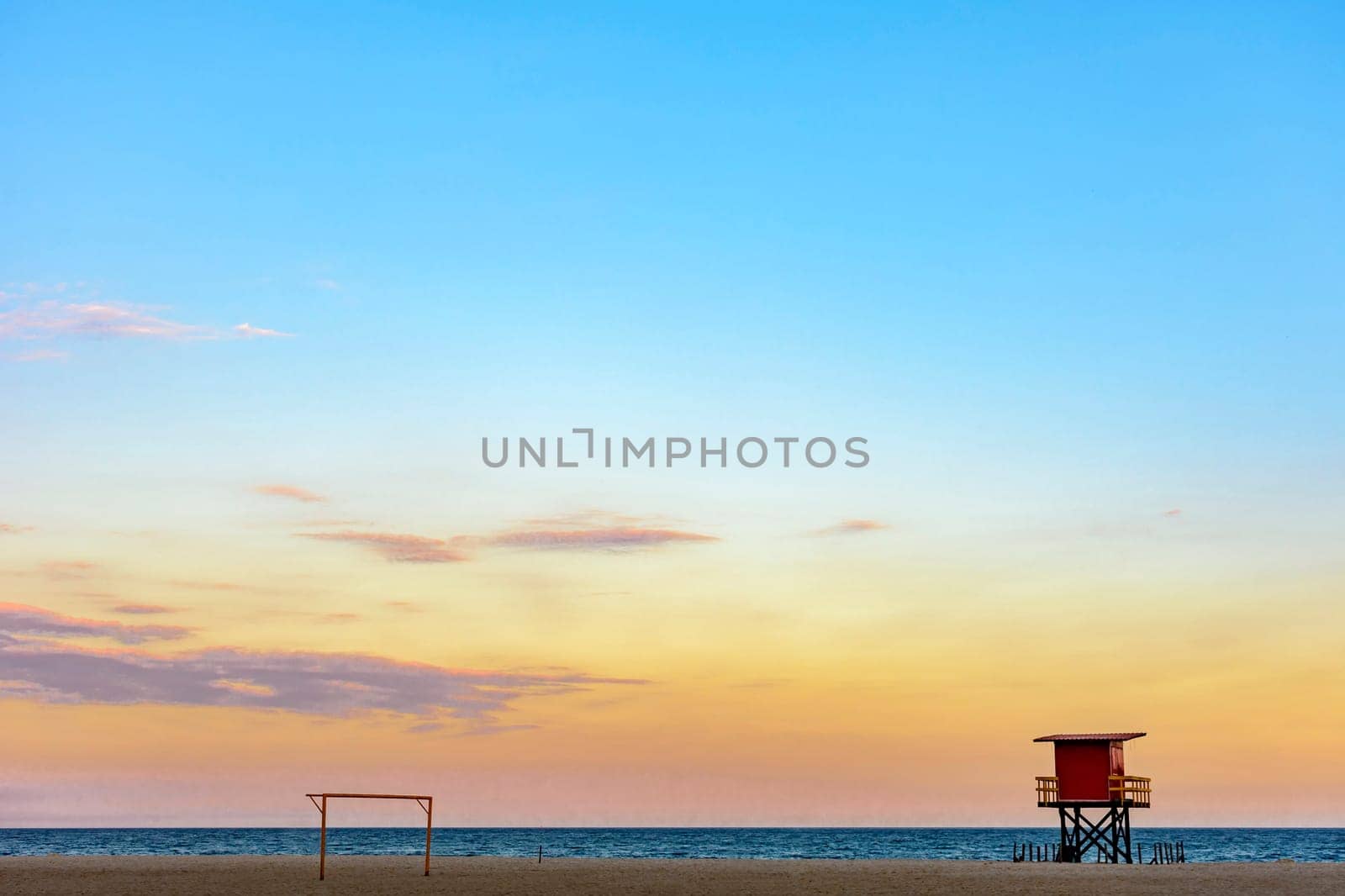 Rescue cabin on Copacabana beach at a tropical sunset on Rio de Janeiro city, Brazil