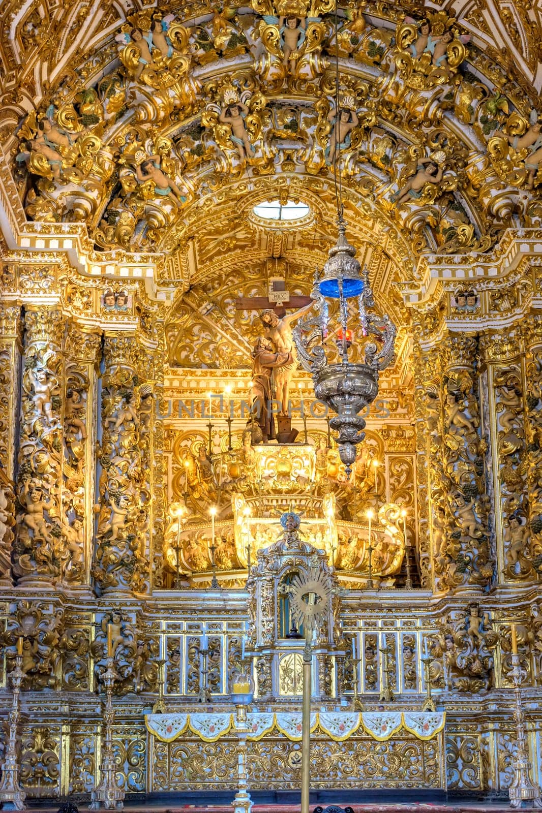 Beautiful gold-plated baroque altar in old and historic church in Pelourinho district, city of Salvador, Bahia