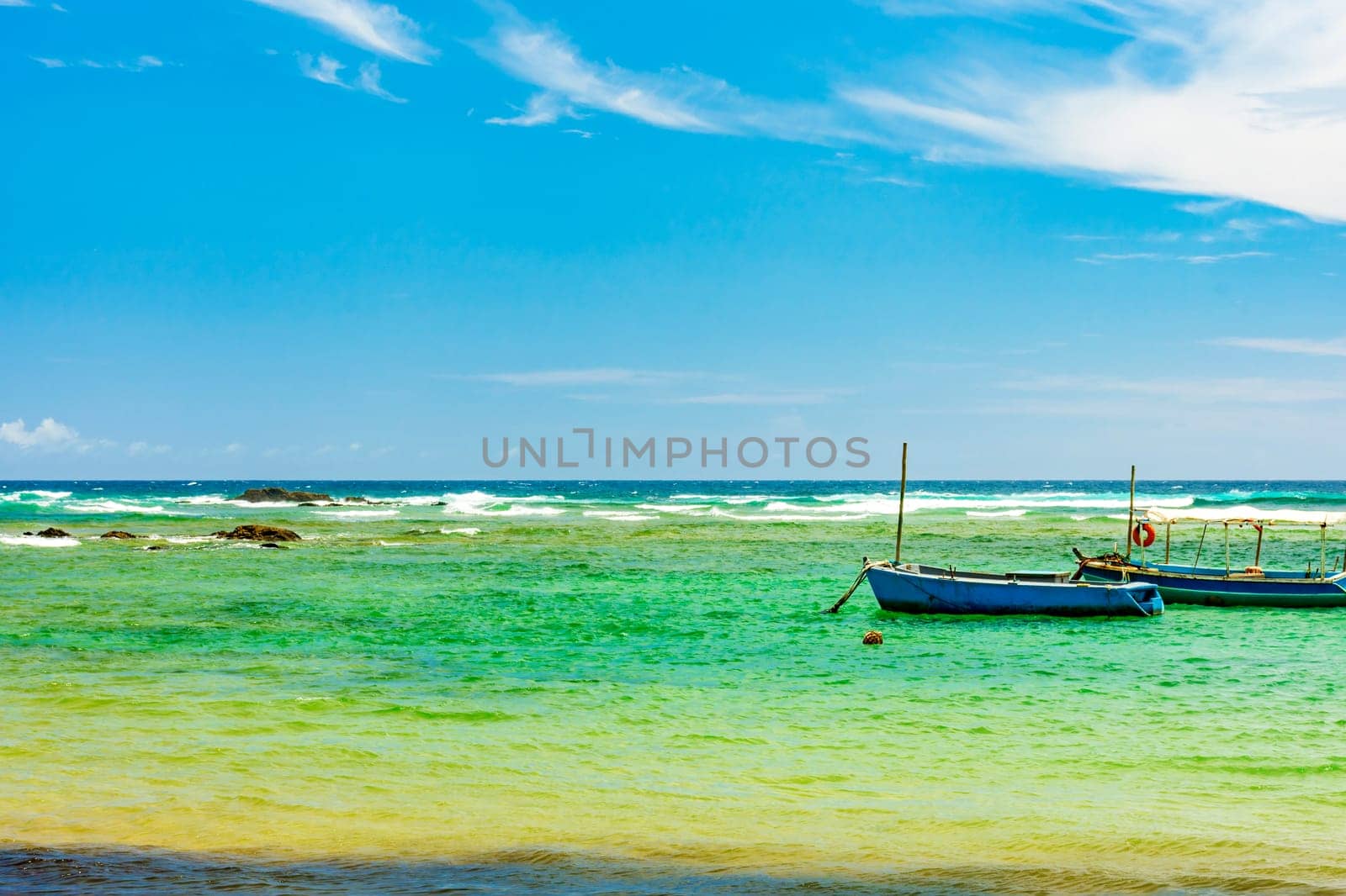 Boats on the waters of the paradisiacal beach by Fred_Pinheiro