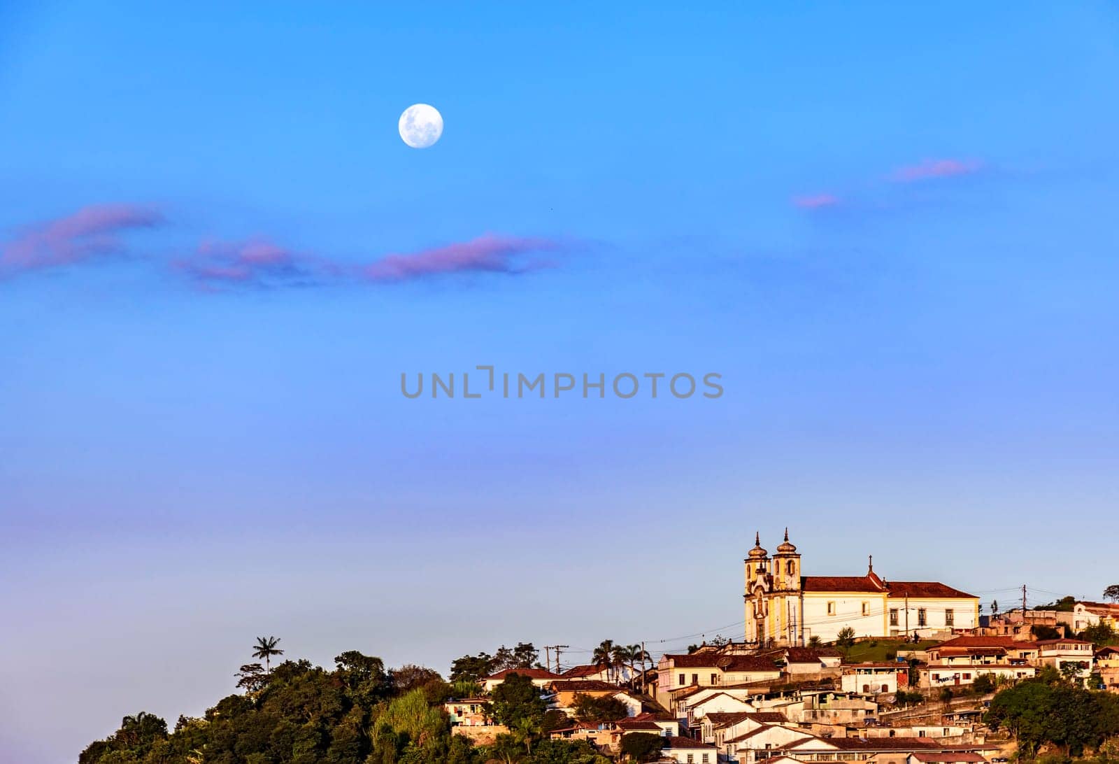 Colonial style church on the mountain with moonlight by Fred_Pinheiro
