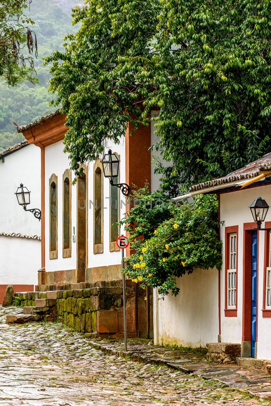 Colonial houses with colorful facades and cobblestone slopes in the historic city of Tiradentes, one of the most famous in the state of Minas Gerais