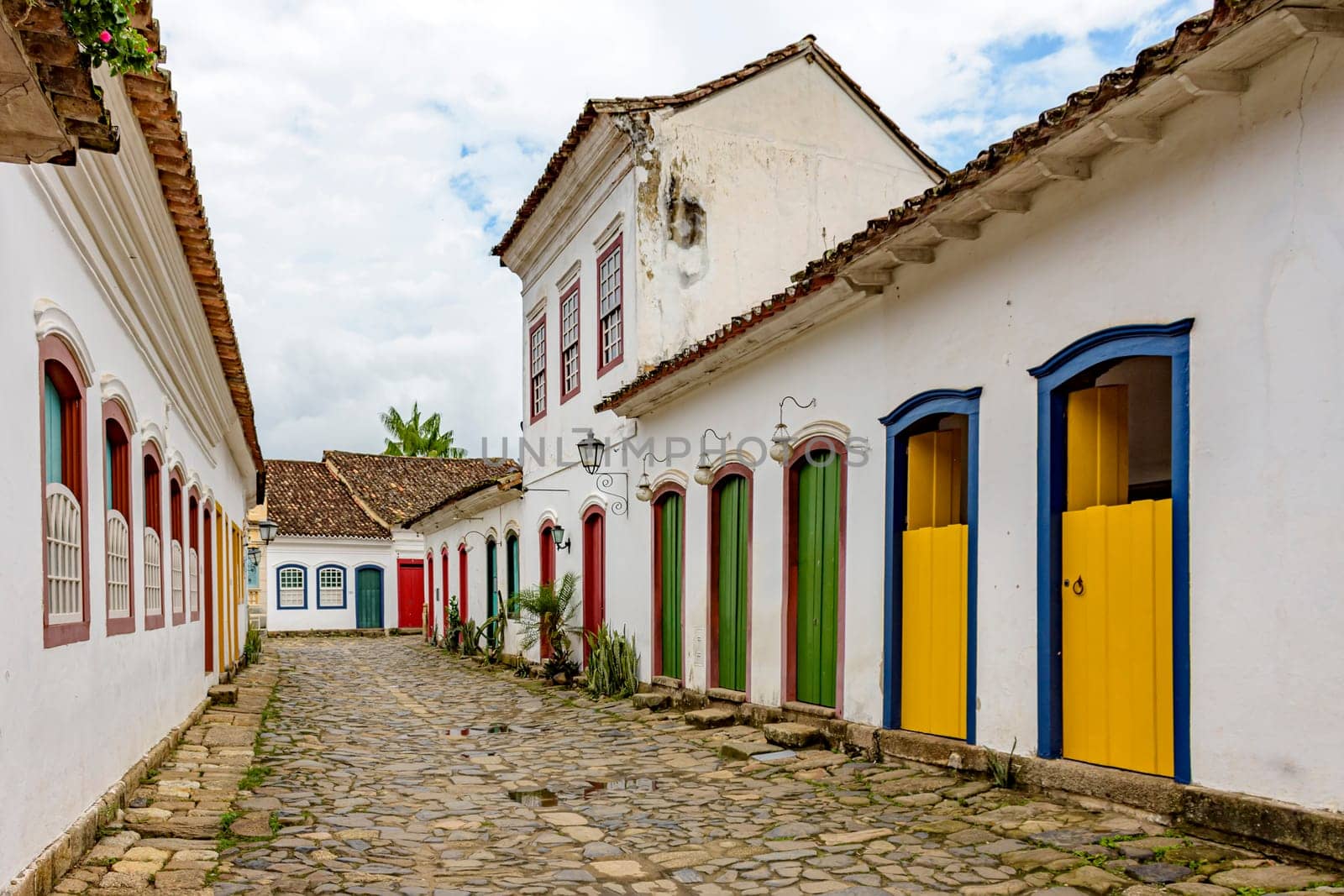 Colonial-style houses on the cobblestone streets by Fred_Pinheiro