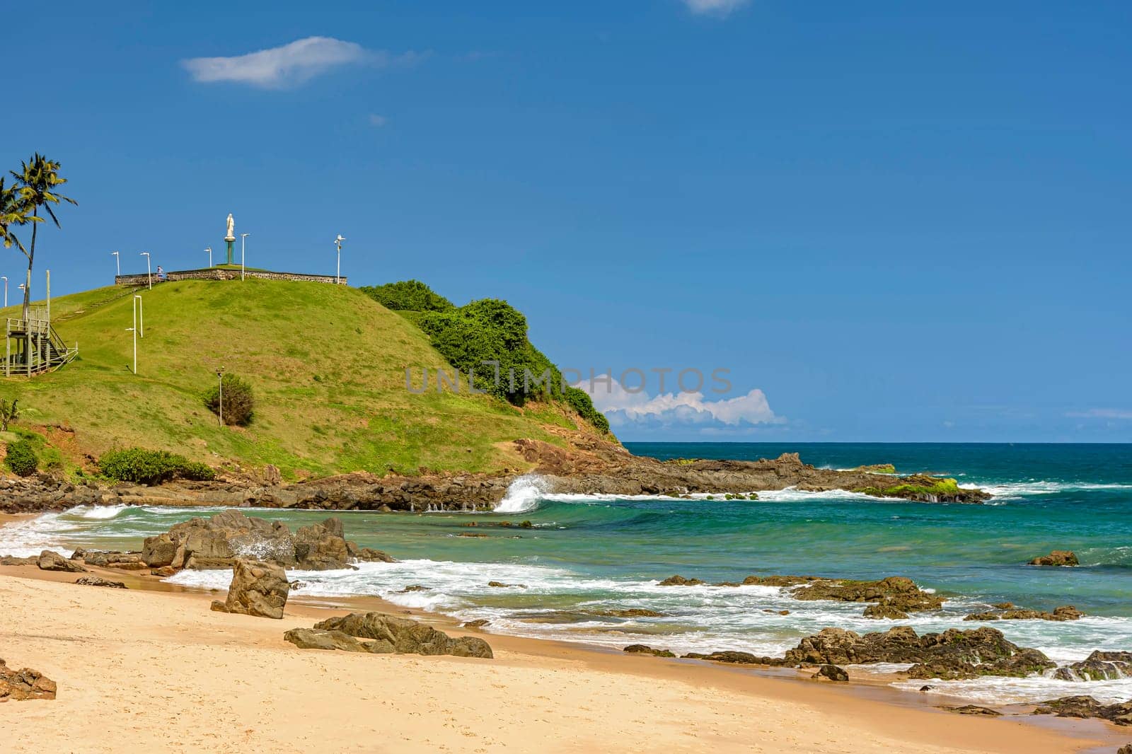 View of hill of Christ and the ocean located on the beach of Barra urban coast of Salvador in Bahia