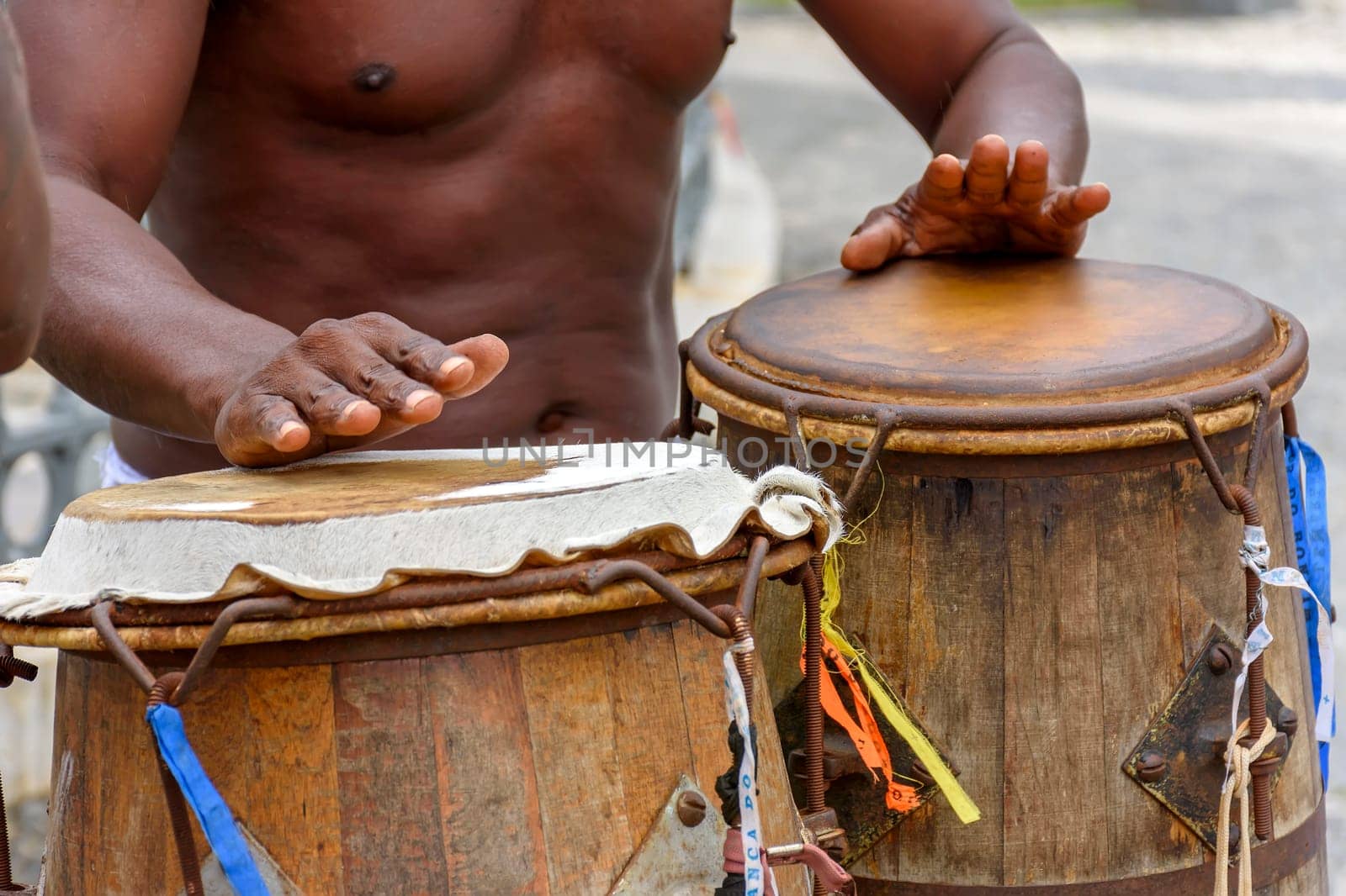 Musician playing brazilian atabaque by Fred_Pinheiro