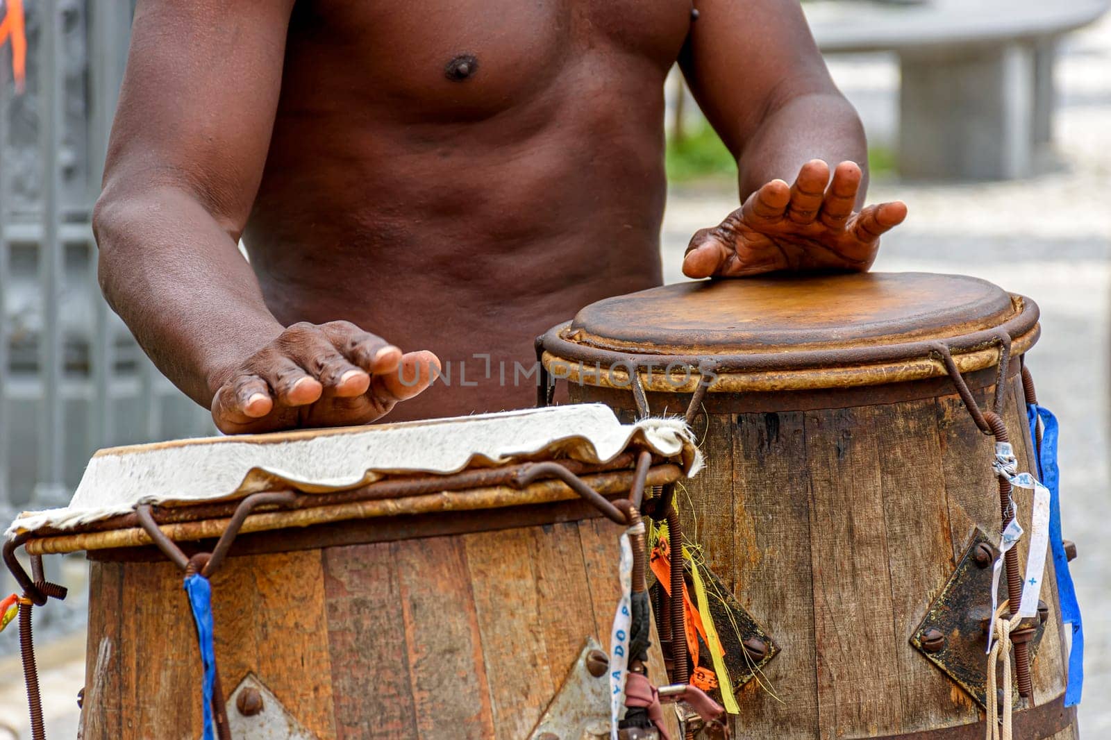 Musicians playing traditional instruments used in capoeira, a mix of fight and dance from Afro-Brazilian culture