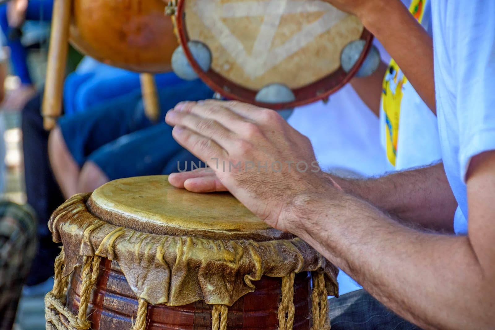 Rustic percussion instrument called atabaque and used in capoeira and Brazilian samba performances