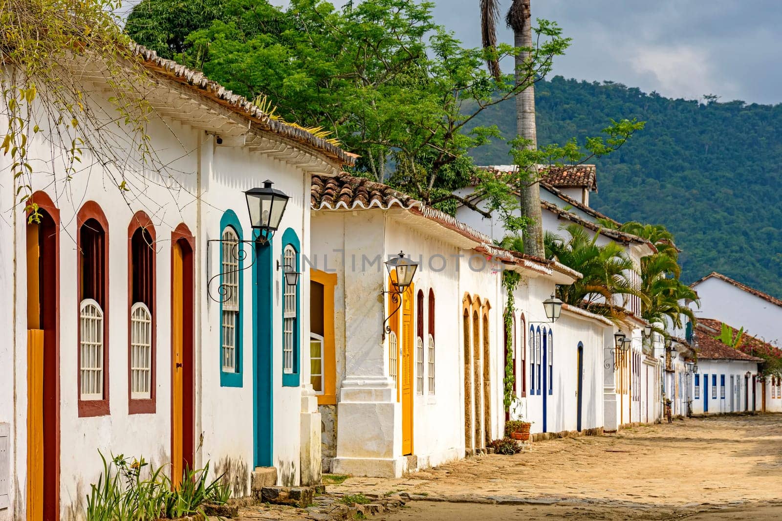 Streets of cobblestone and old houses in colonial style on the streets of the old and historic city of Paraty founded in the 17th century on the coast of the state of Rio de Janeiro, Brazil