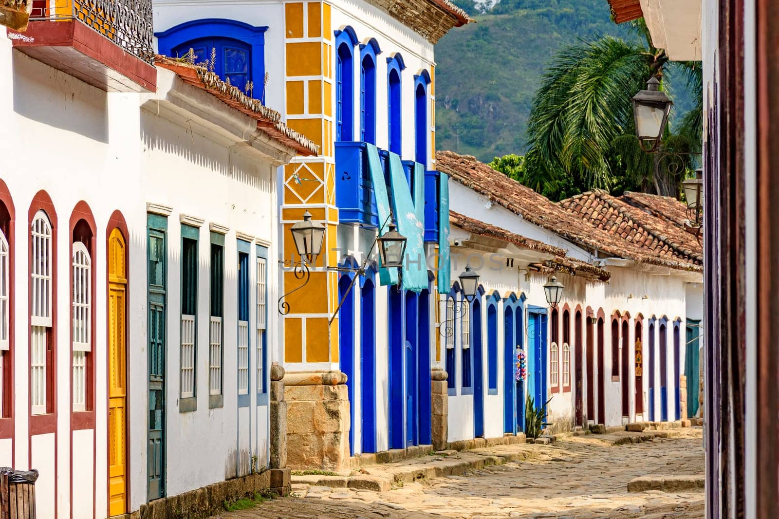 Streets of cobblestone and old houses in colonial style on the streets of the old and historic city of Paraty founded in the 17th century on the coast of the state of Rio de Janeiro, Brazil