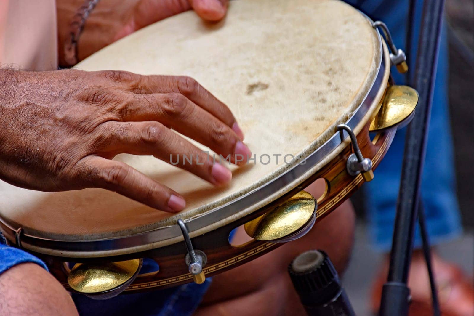 Tambourine being played by a ritimist during a samba performance in Rio de Janeiro, Brazil