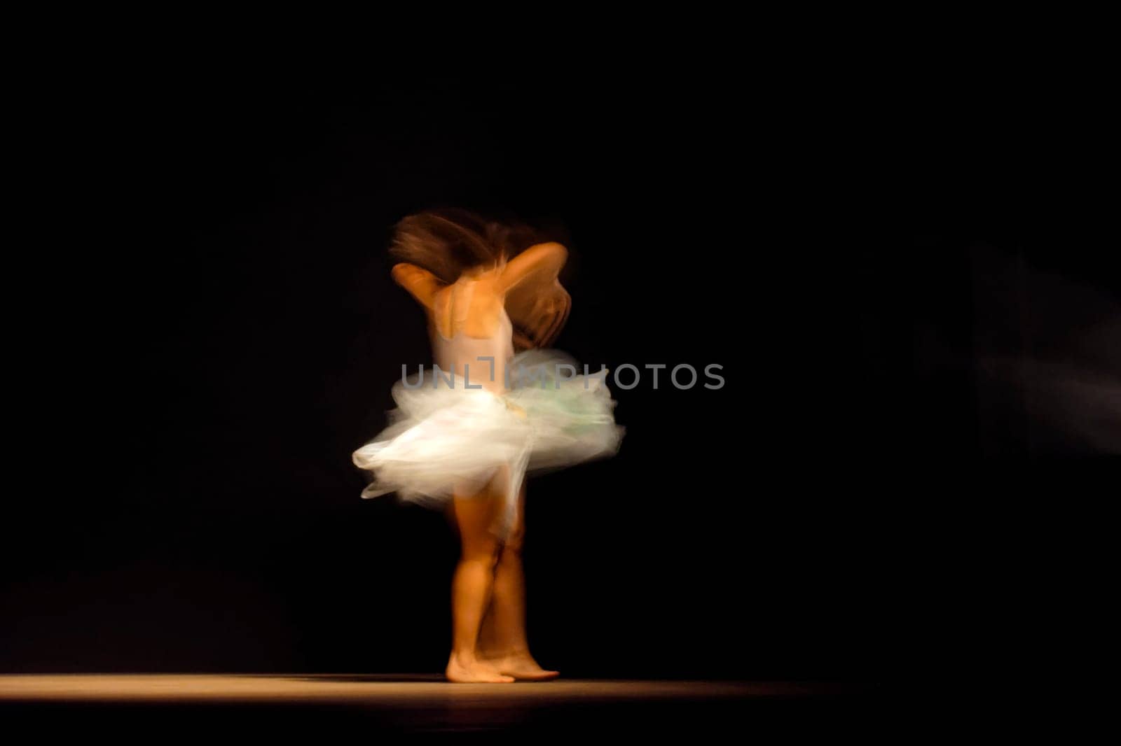 Young dancer with motion blurred by Fred_Pinheiro