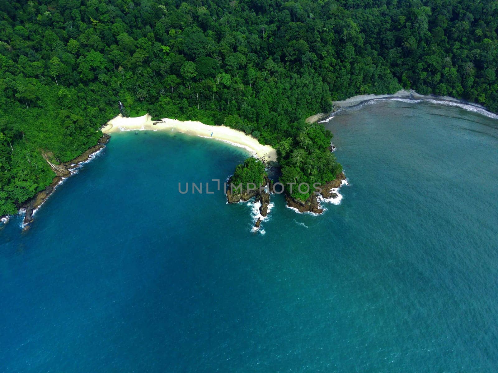 The beautiful view of Teluk Ijo or Green Bay in Banyuwangi, Indonesia. Aerial Photography.