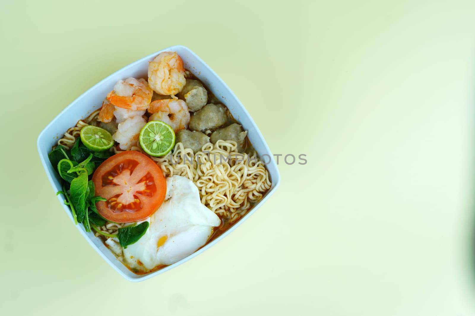 soto seger boyolali is a traditional beef soup with rice and sprouts served in a bowl.