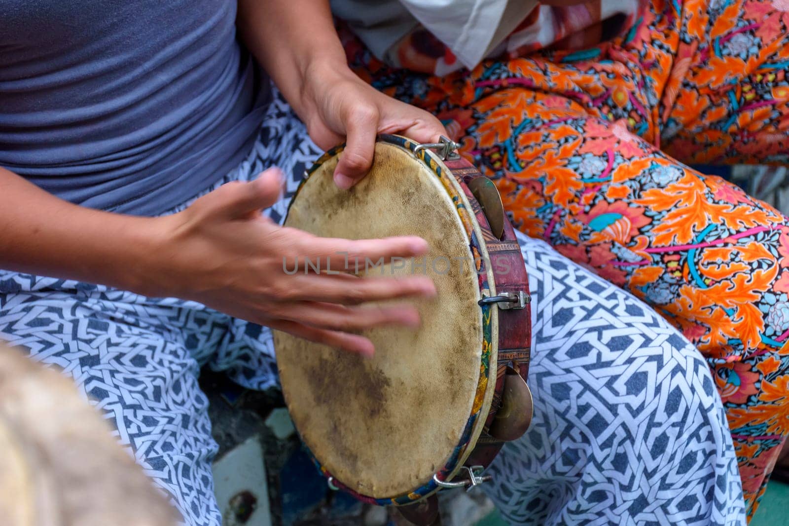 Tambourine being played by a ritimist during a samba performance in Rio de Janeiro