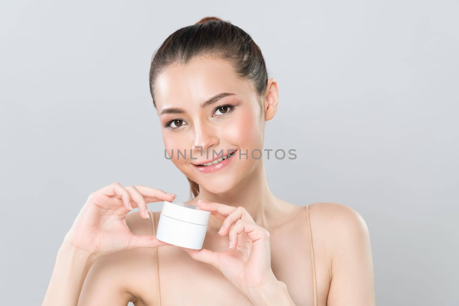 Glamorous beautiful perfect cosmetic skin with soft makeup woman portrait hold mockup jar cream or moisturizer for skincare treatment and anti-aging product advertisement in isolated background.