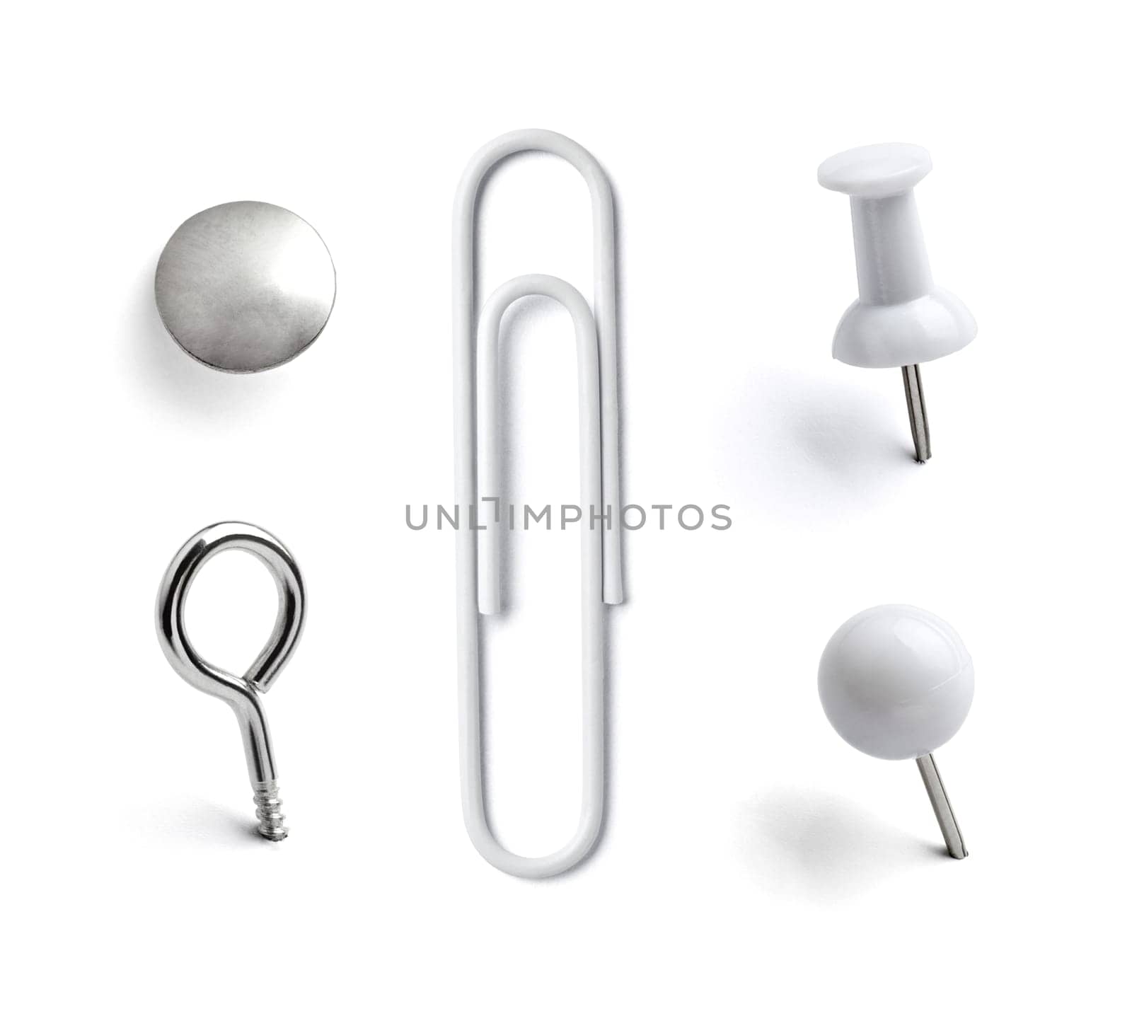 close up of push pin paperclip on white background