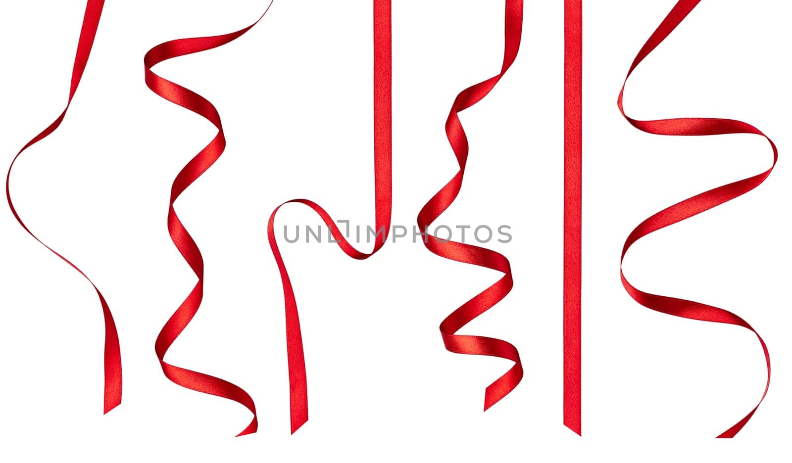 collection of various red ribbon pieces on white background. each one is shot separately