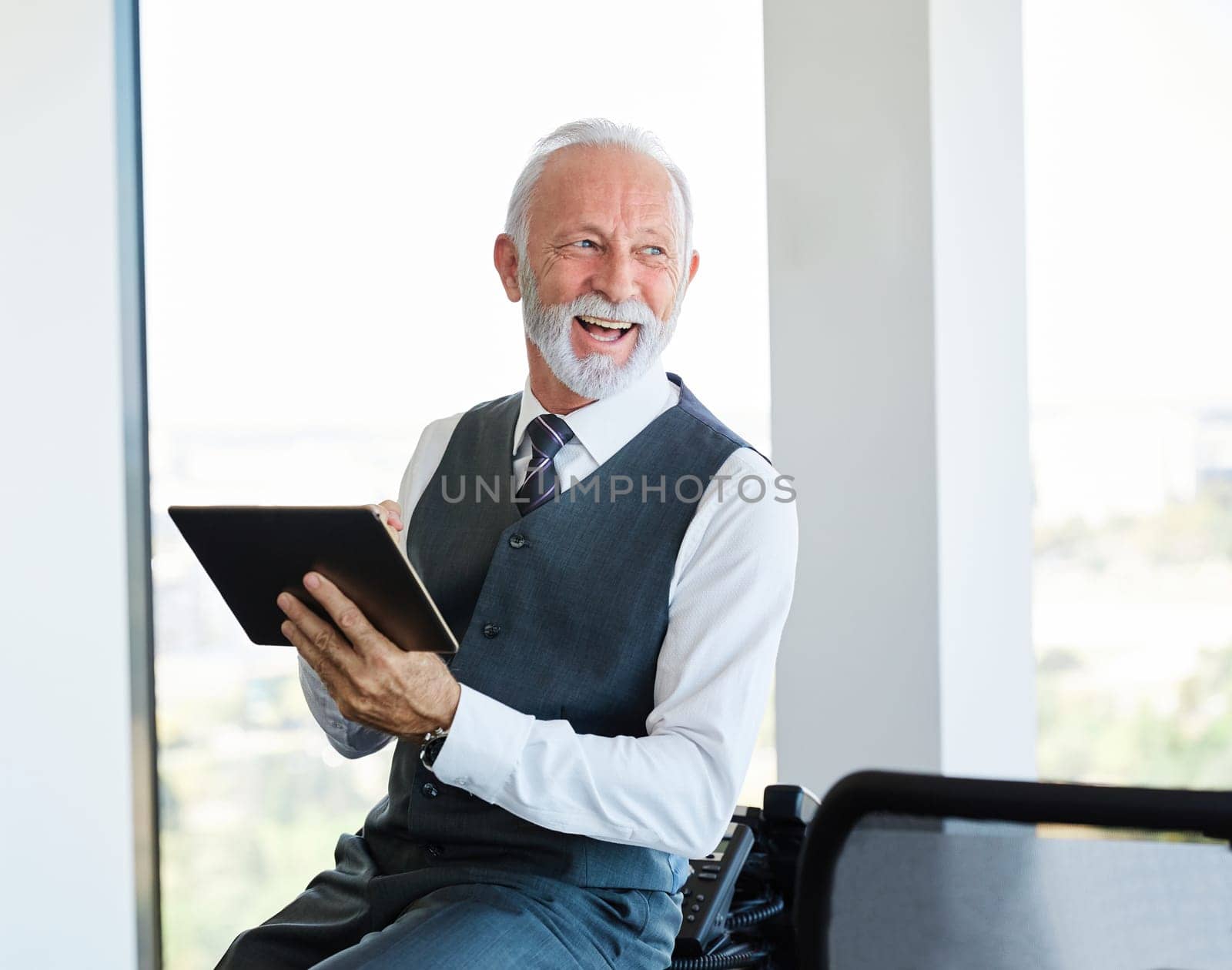senior businessman tablet office work business computer casual mature gray hair mature elderly man portrait by Picsfive