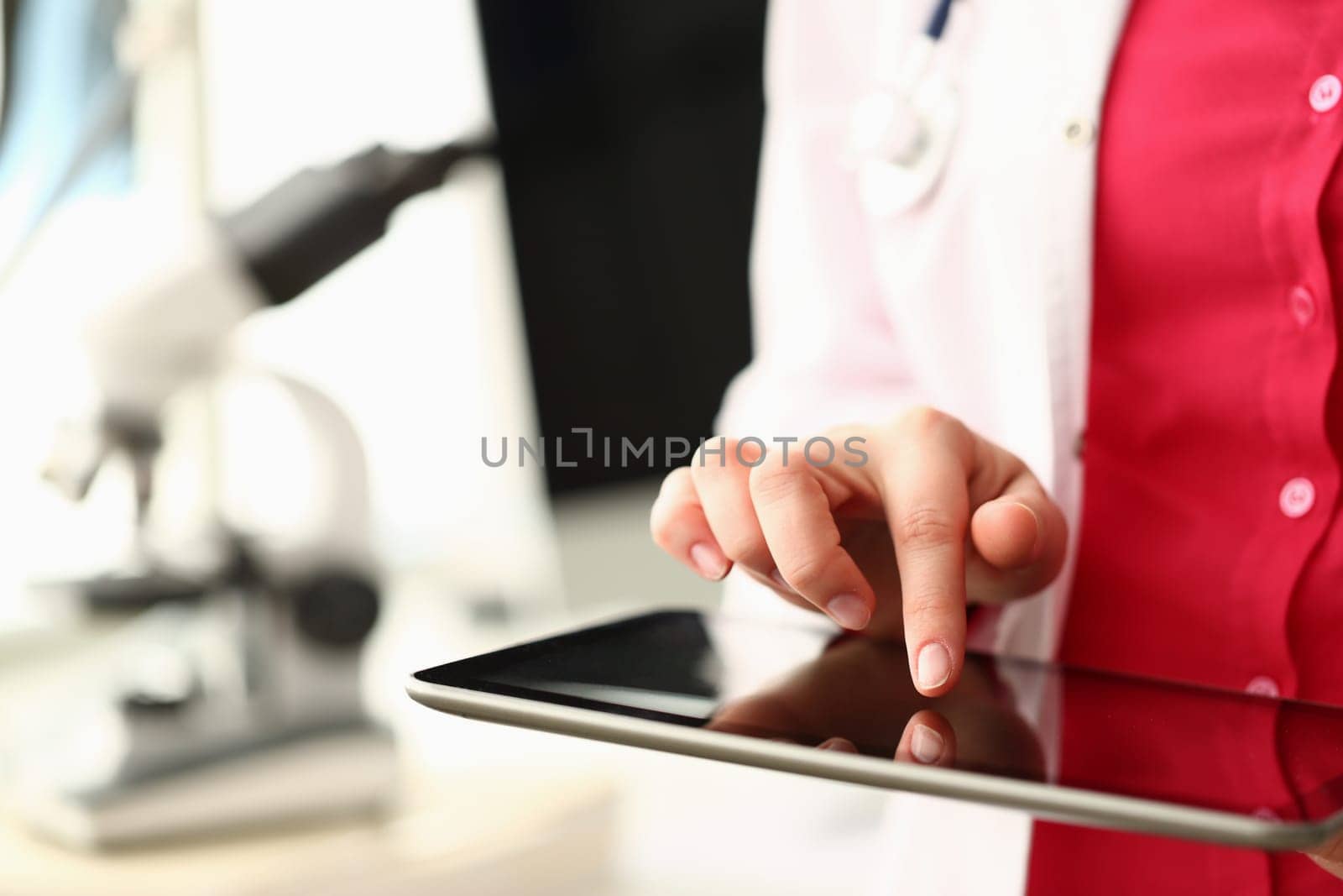 Medical doctor works with modern digital tablet medical network concept by kuprevich