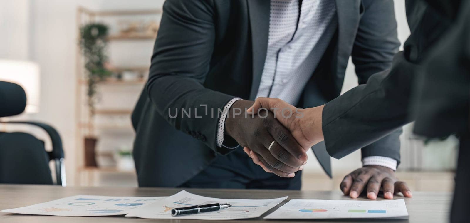Businessmen making handshake with partner, greeting, dealing, merger and acquisition, business cooperation concept, for business, finance and investment background, teamwork and successful business..