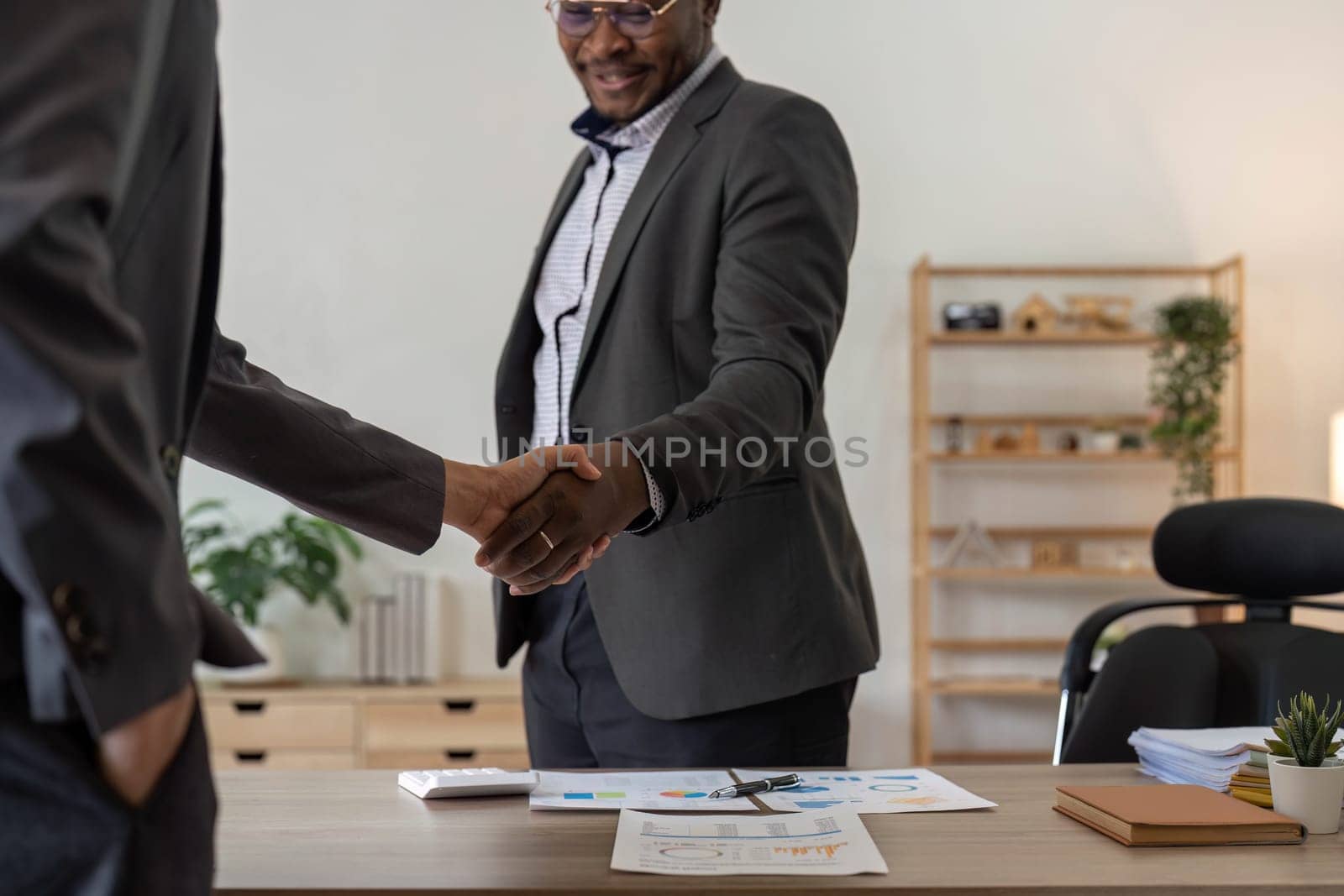 Businessmen making handshake with partner, greeting, dealing, merger and acquisition, business cooperation concept, for business, finance and investment background, teamwork and successful business..
