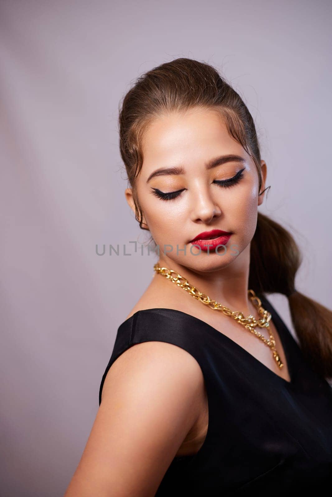 portrait shot of a young Ukrainian woman on the background, after make-up and hairstyle, for clothing advertising by mosfet_ua