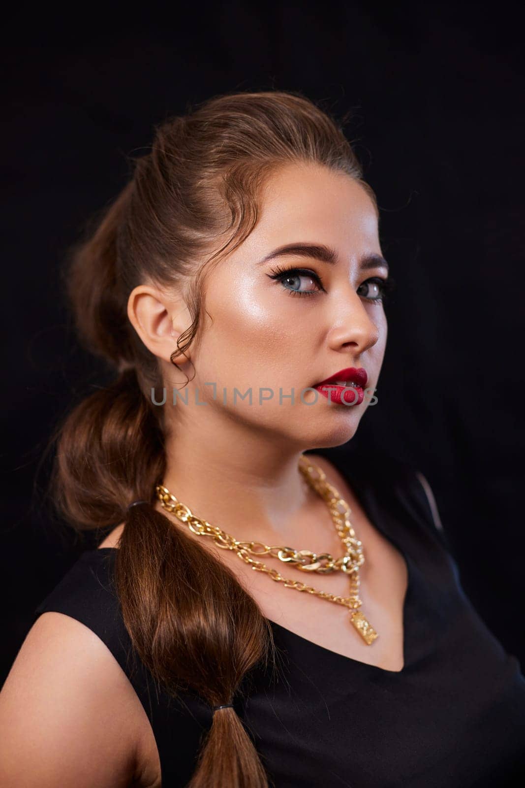 portrait shot of a young Ukrainian woman on the background, after make-up and hairstyle, for clothing advertising by mosfet_ua