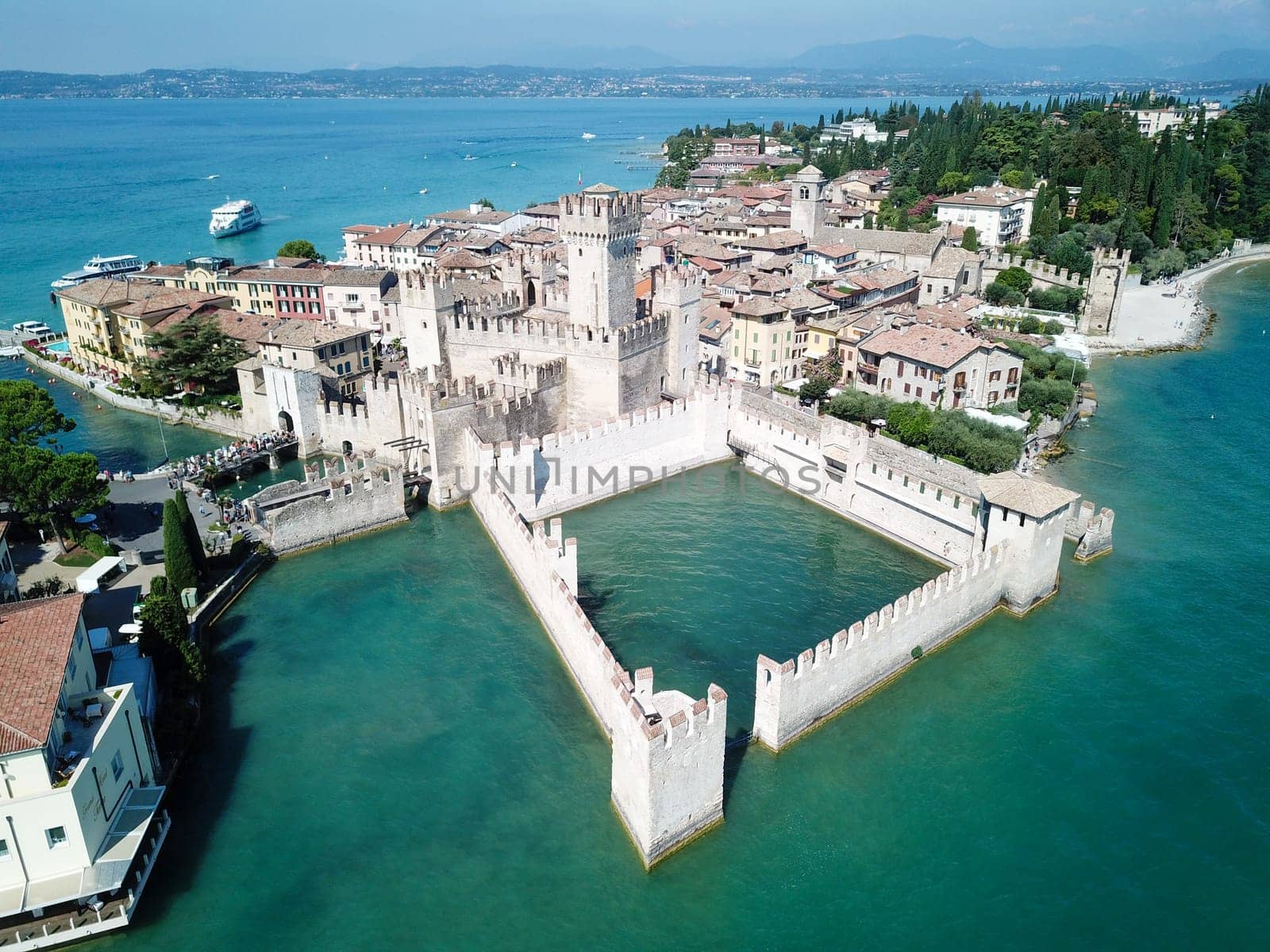 Scallgero Castle Aerial shots Sirmione Lake Garda Italy. High quality photo