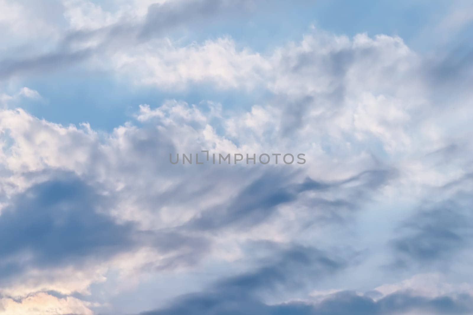 Background of blue sky with white clouds by Olayola