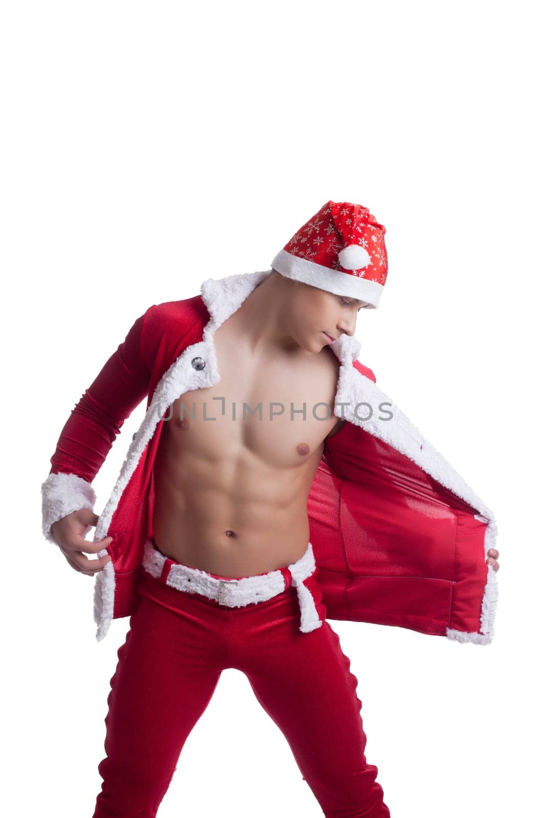 sexy athletic man undress santa claus dress isolated