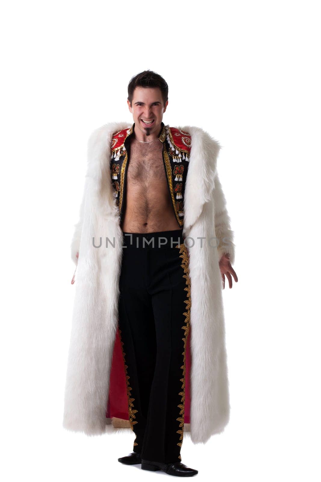 Full length portrait of toreador in fur coat. Isolated on white
