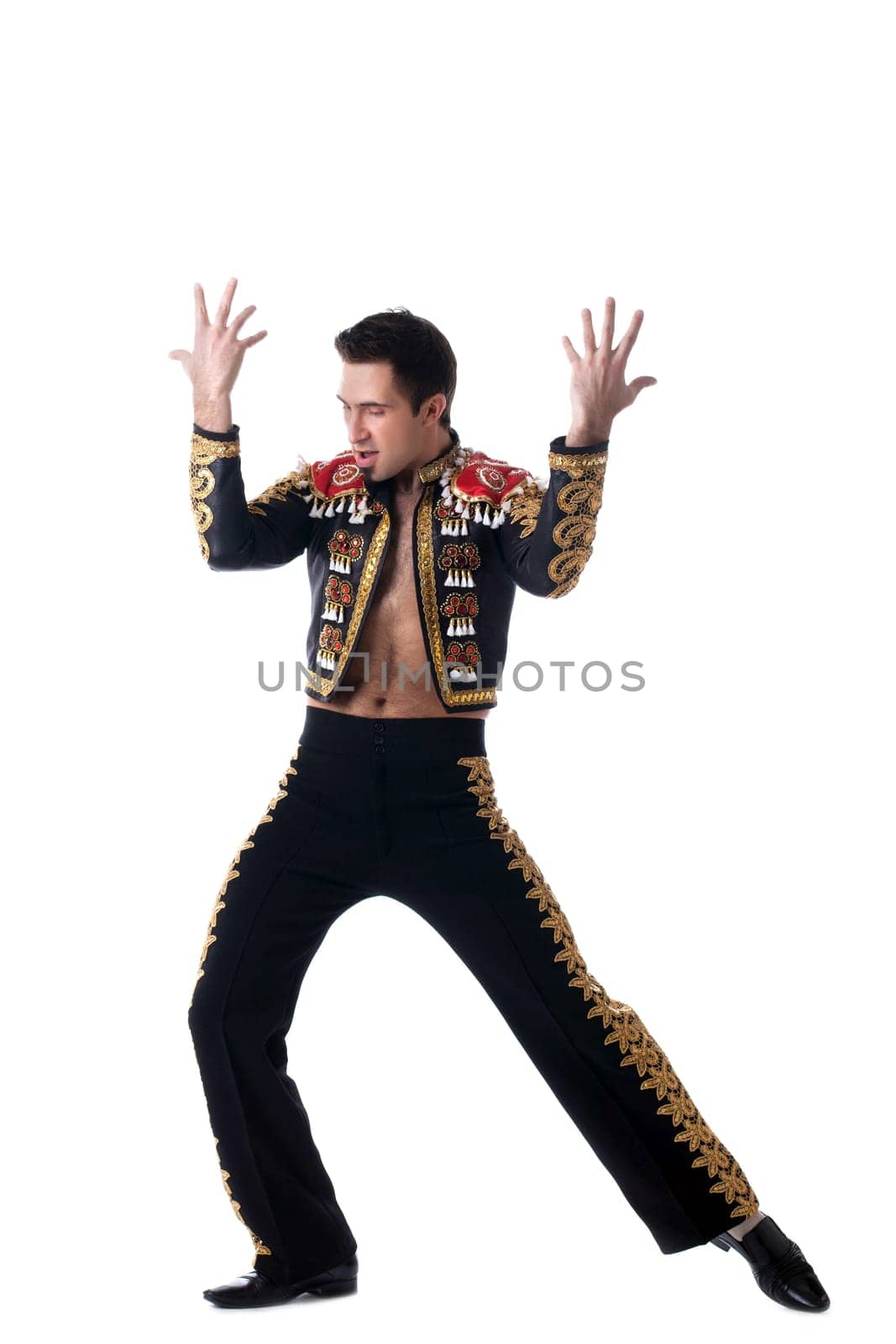 Full length portrait of dancer in toreador costume. Isolated on white