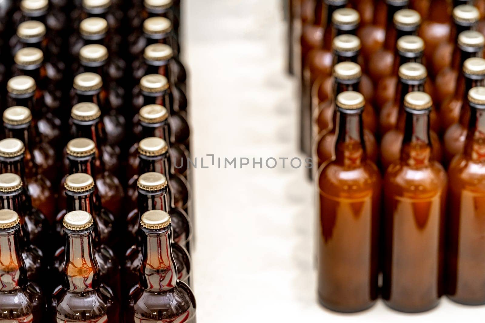 glass bottles with beer in the warehouse of the brewery. High quality photo