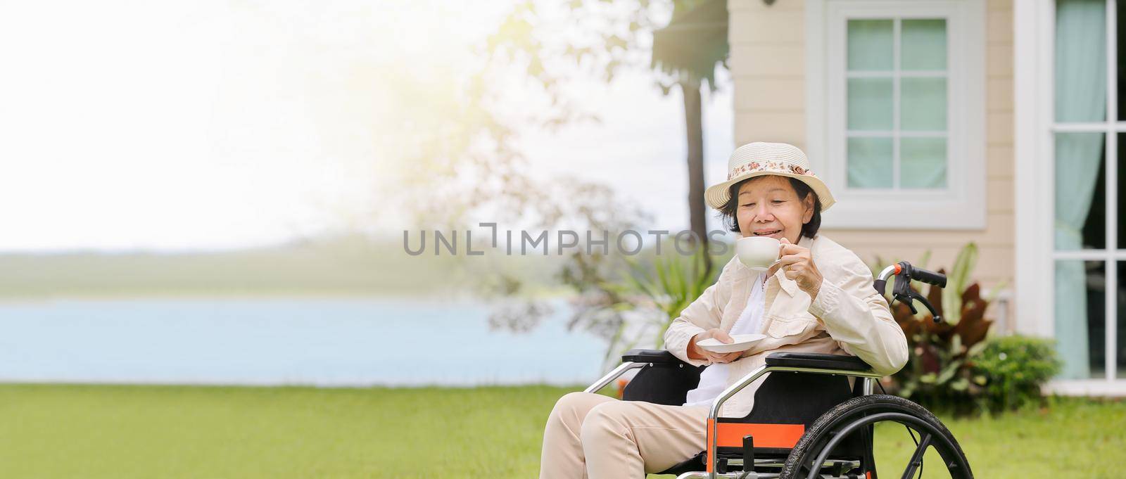 elderly woman relax in backyard by toa55