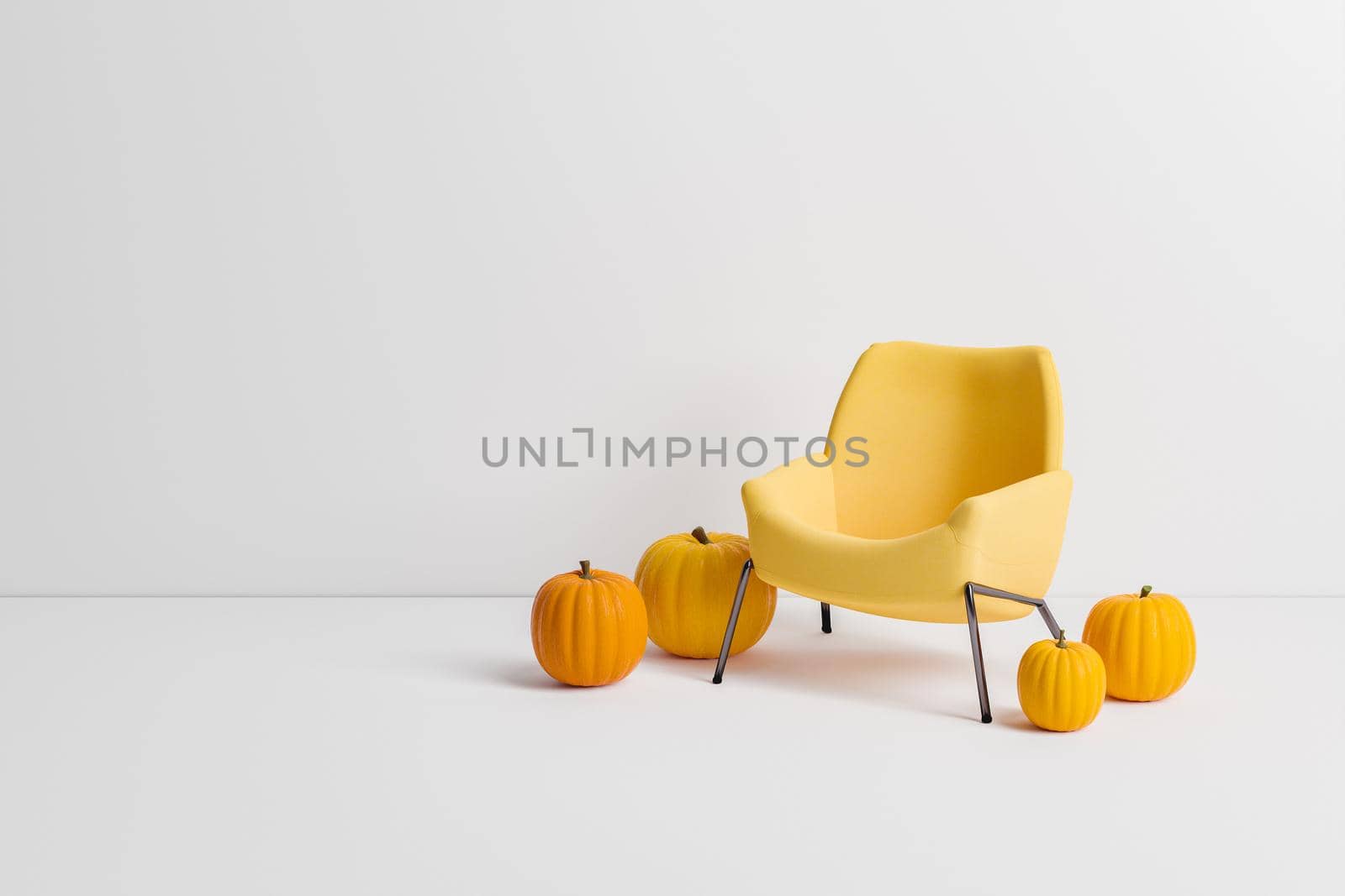 minimal sofa with pumpkins and space for text by asolano