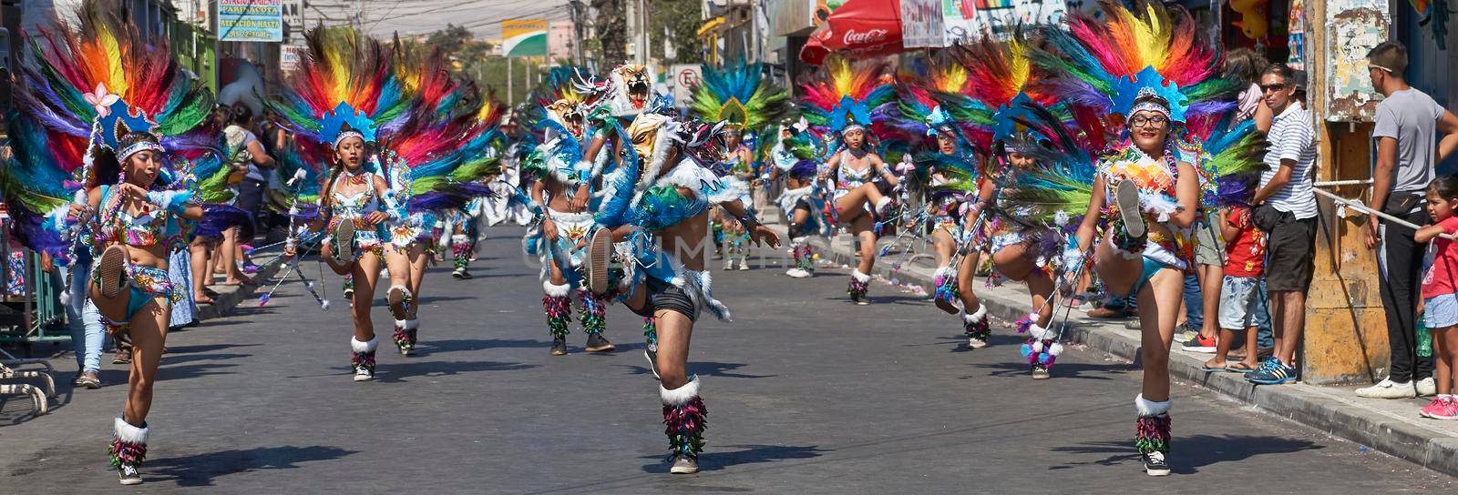 Arica, Chile - January 23, 2016: Tobas dancers in traditional Andean costume performing at the annual Carnaval Andino con la Fuerza del Sol in Arica, Chile.