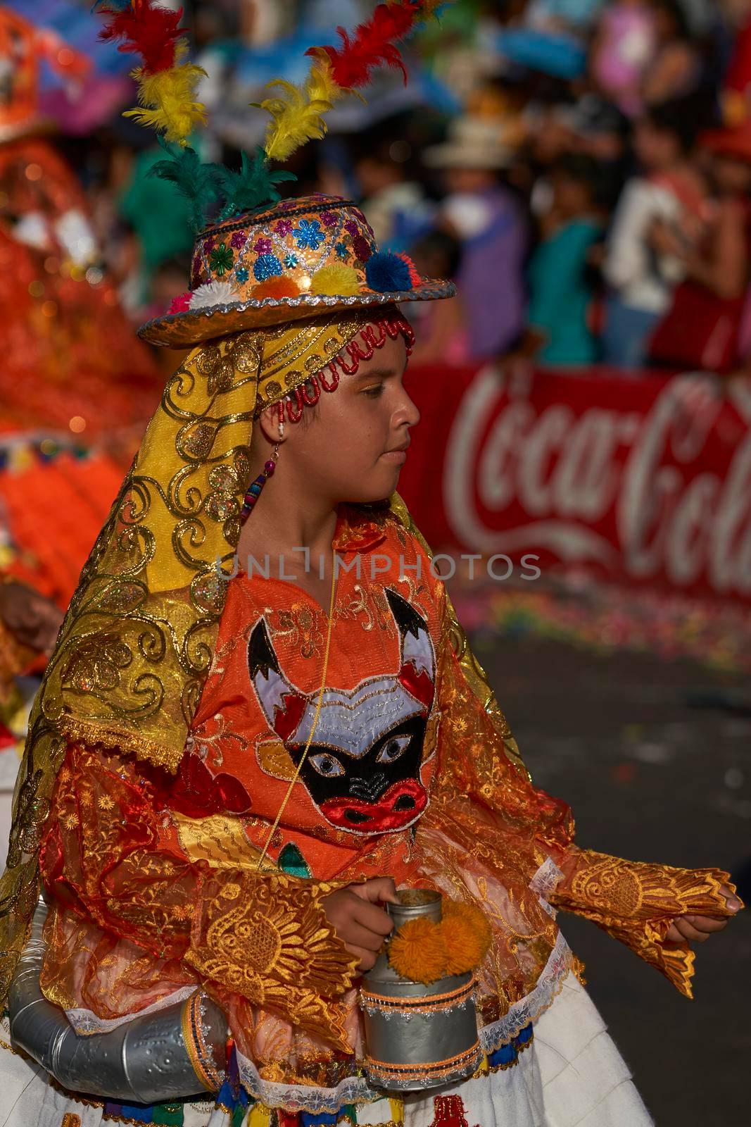 Arica, Chile - January 23, 2016: Members of a Waca Waca dance group in ornate costume performing at the annual Carnaval Andino con la Fuerza del Sol in Arica, Chile.